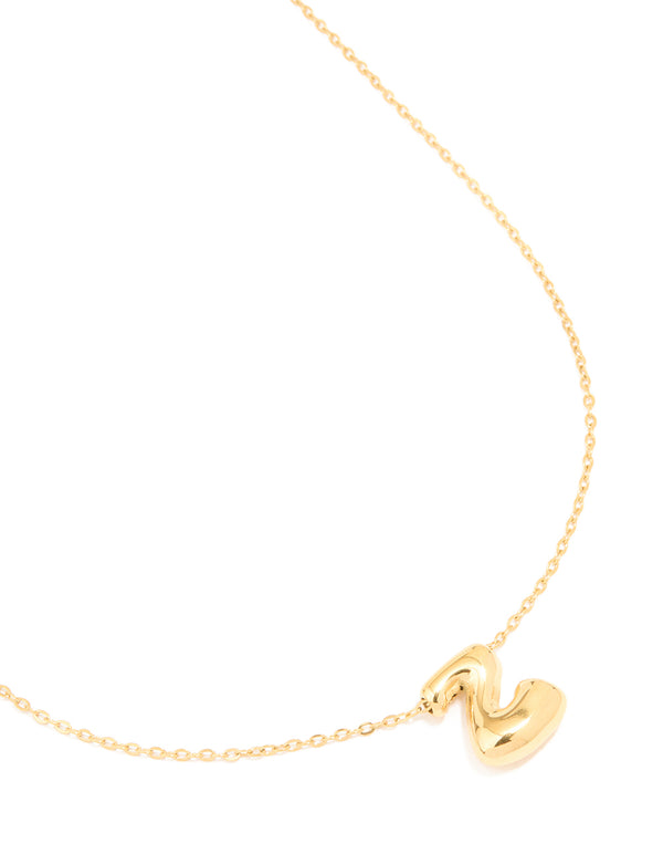 Showcasing a waterproof gold plated stainless steel large bubble letter Z necklace with pendant and initials close up view