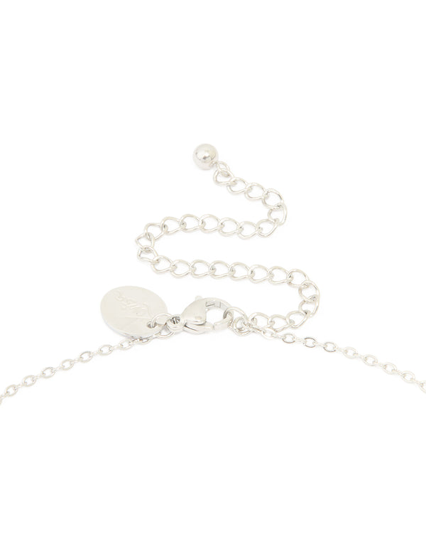 This waterproof stainless steel initial pendant necklace in silver with large bubble letter M clasp detail view