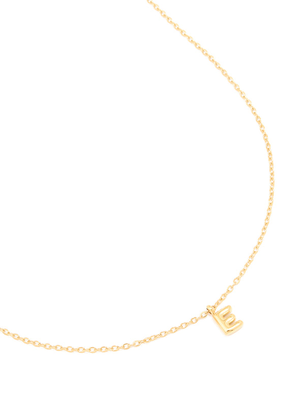 Showcasing a waterproof gold plated stainless steel mini bubble letter E pendant initial necklace in dainty style front view