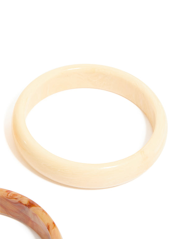Designed with gold and neutral acrylic 3-pack bangles in bracelet set closure detail view