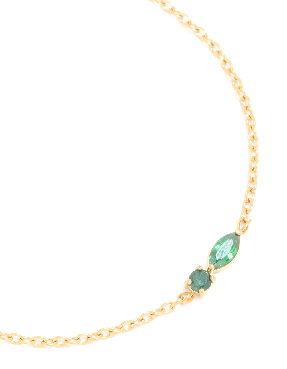 Presenting a waterproof gold plated stainless steel may green cubic zirconia birthstone bracelet in a dainty aesthetic close up view