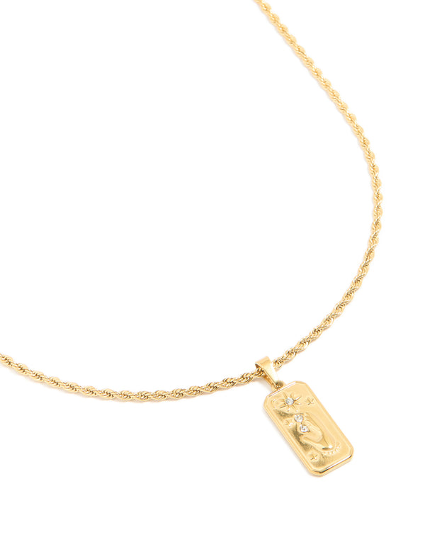 Showcasing a celestial and floral pendant necklace with waterproof gold plated stainless steel in close up view