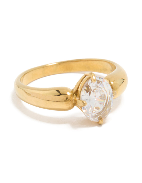 Showcasing a waterproof thick gold plated stainless steel ring with cubic zirconia in an oval cut, statement design front view