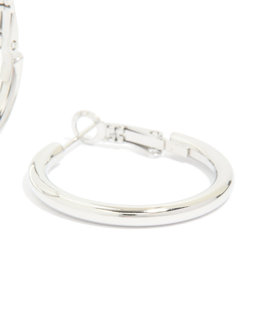 Showcasing waterproof stainless steel, these hoop earrings deliver bold statement style in silver post detail view