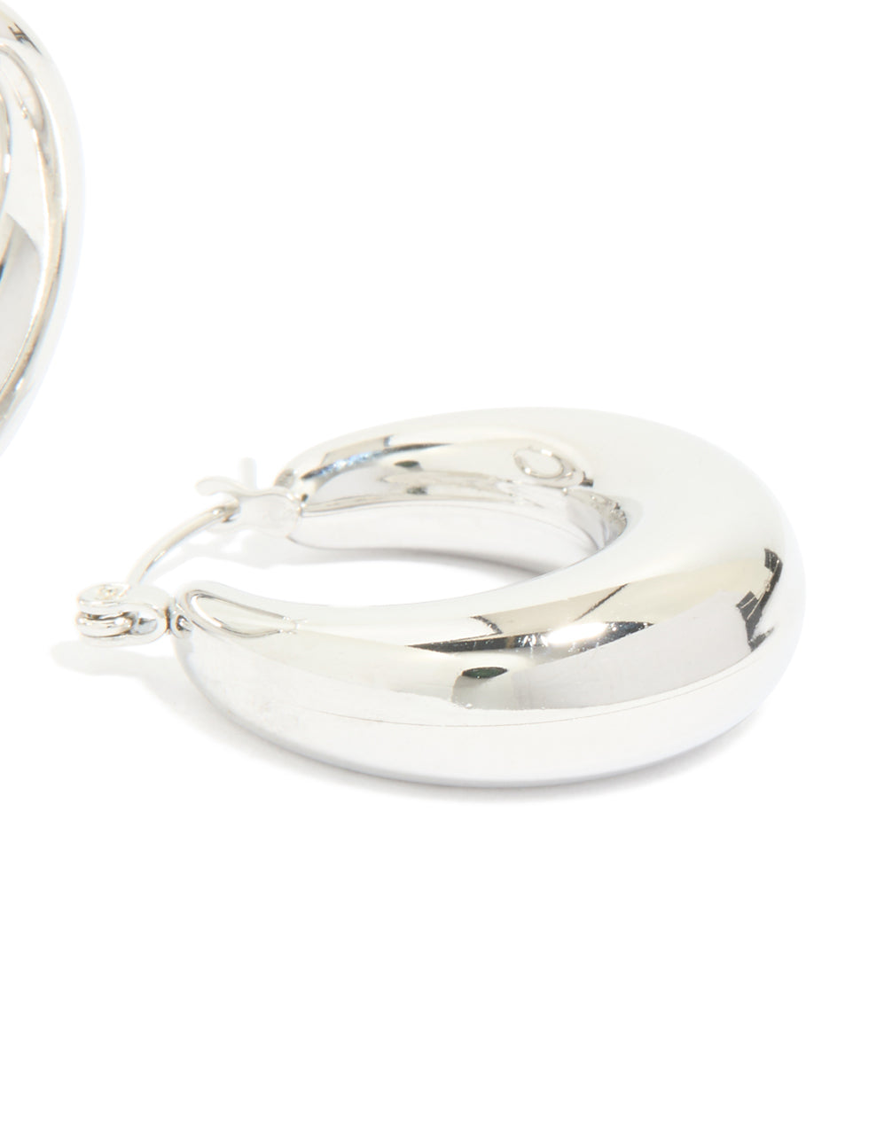 Crafted from waterproof stainless steel small chunky huggie earrings with closure in silver post detail view