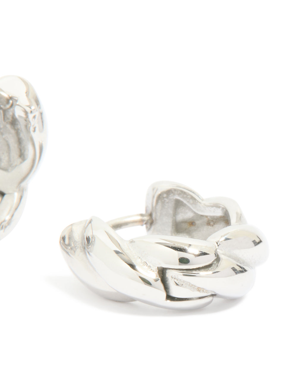 Designed with waterproof stainless steel, twisted hoop earrings in silver close up view