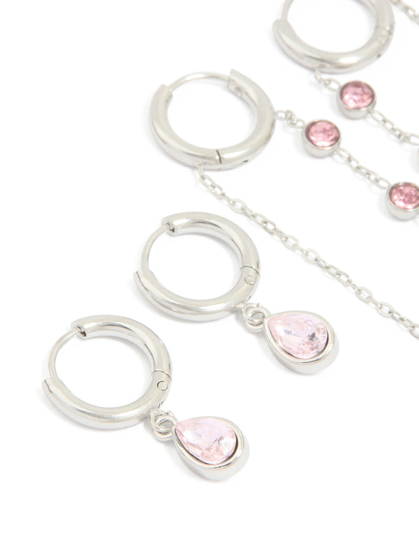 Crafted from waterproof stainless steel pink cubic zirconia chain droplet and classic huggie earrings 2-pack in silver and light pink tones close up view