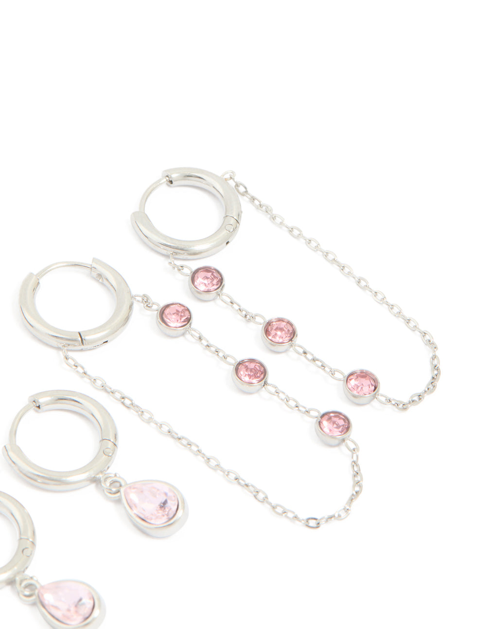 Designed with waterproof stainless steel pink cubic zirconia chain droplet and classic huggie earrings 2-pack in silver and light pink tones post detail view