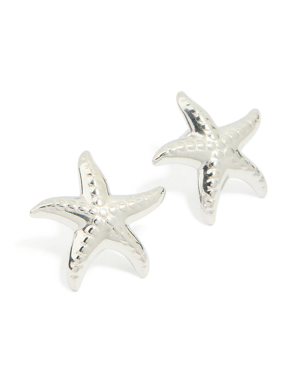 Crafted from waterproof stainless steel, these textured starfish stud earrings feature ocean-inspired charm details in silver front view