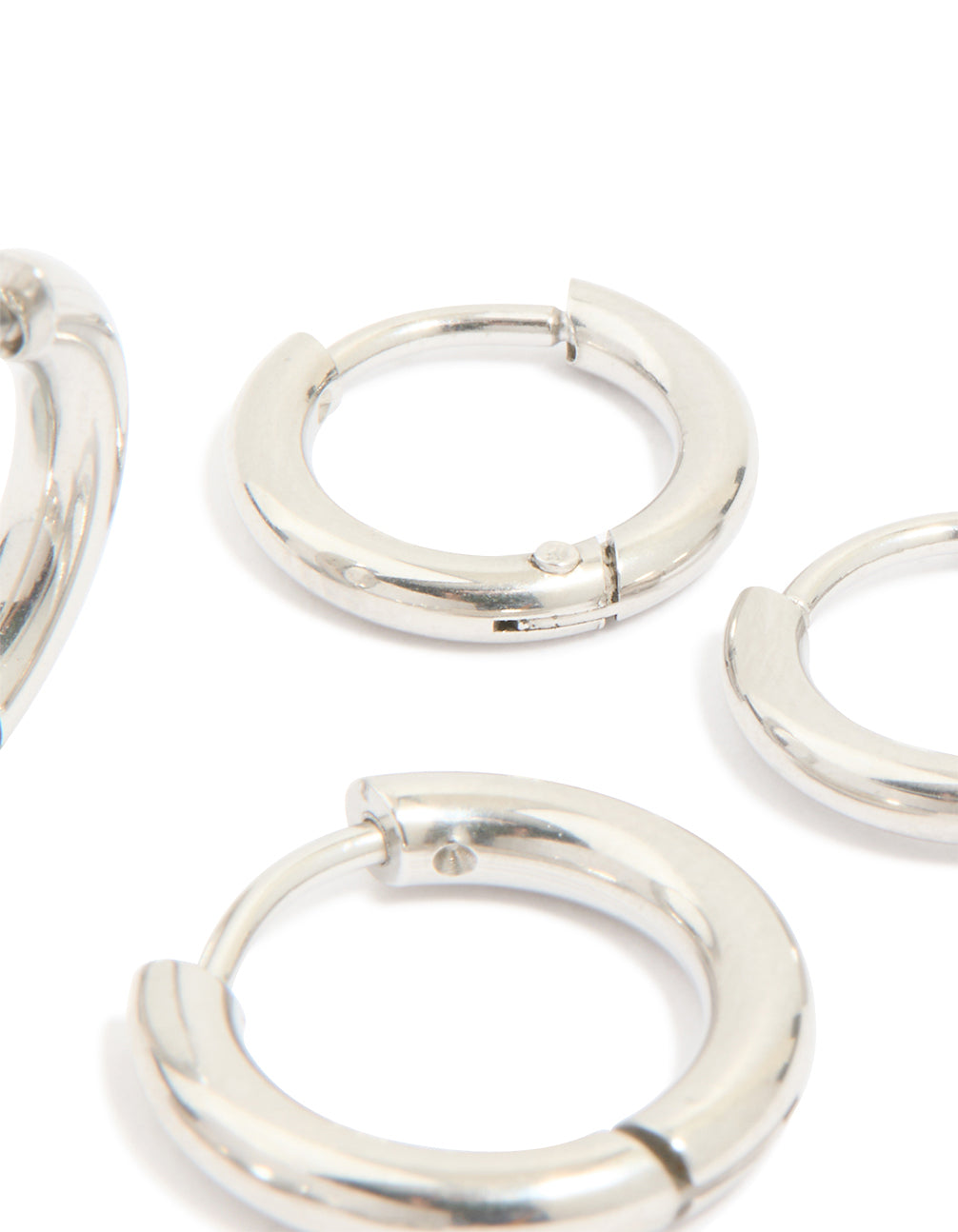 Explore statement waterproof stainless steel cubic zirconia stacking earrings in silver, 4-pack post detail view
