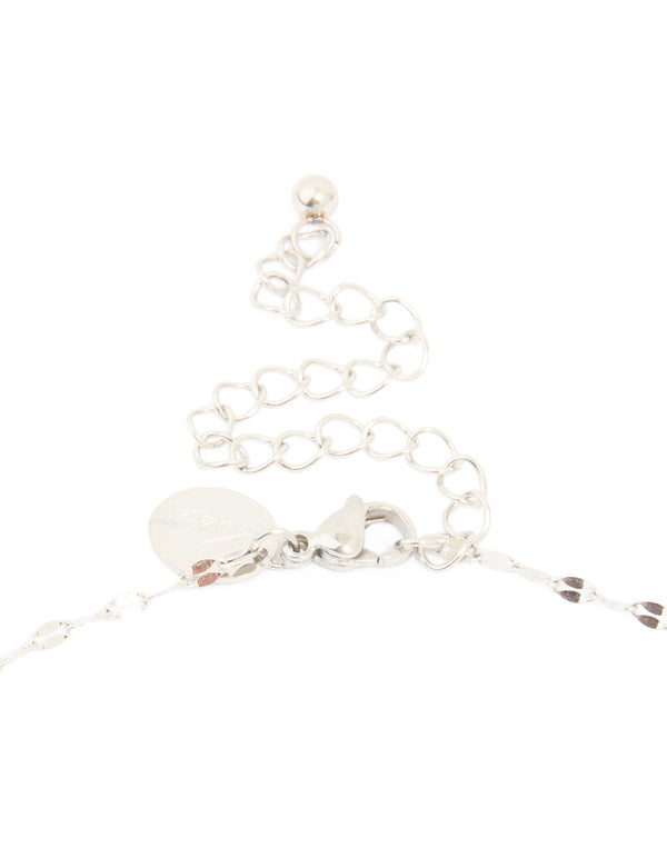 A waterproof stainless steel cross necklace with cubic zirconia in statement style clasp detail view