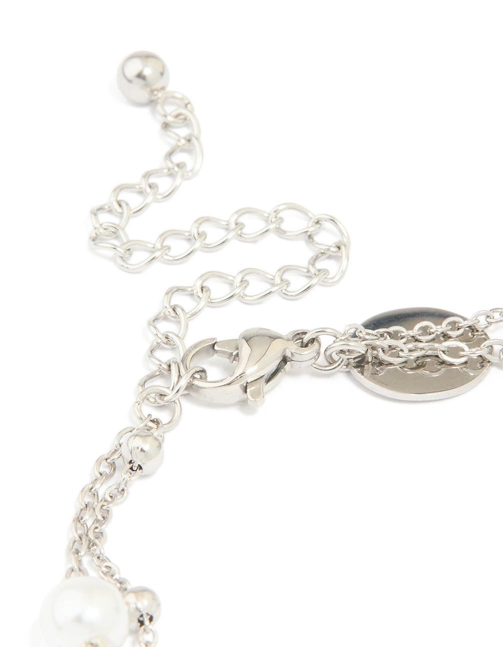 Highlighting waterproof stainless steel pearl and ball layered bracelet in white and silver closure detail view