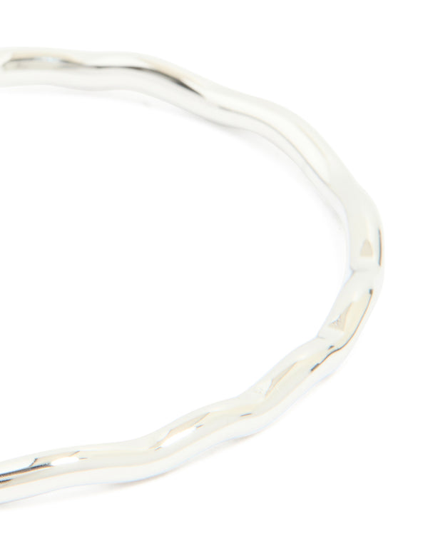 Designed with waterproof stainless steel, this mini wave wrist cuff in silver close up view
