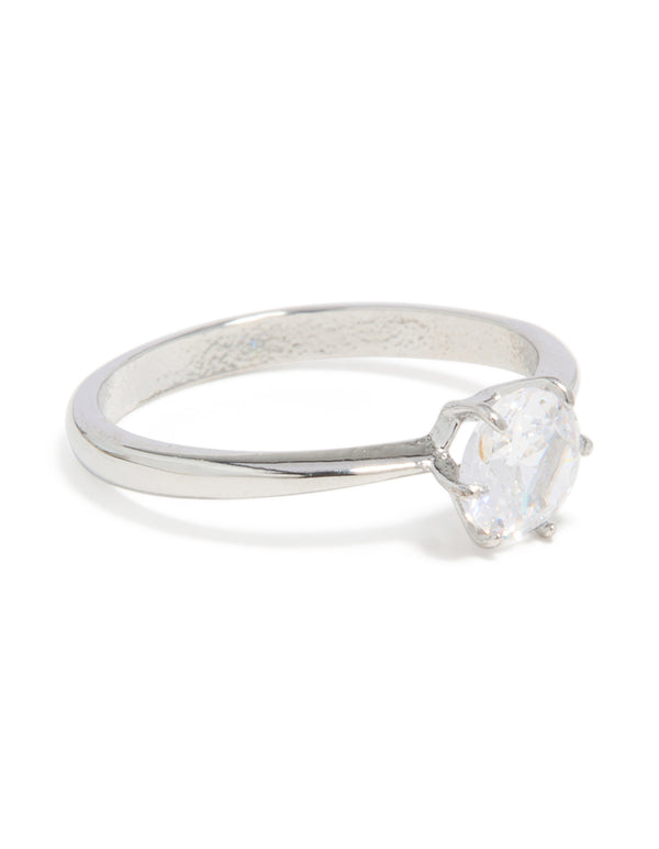 Showcasing a waterproof stainless steel diamante solitaire band ring crafted from silver and clear stone with statement styling side detail view