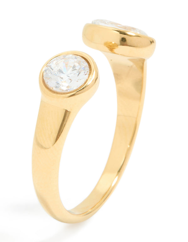 Featuring waterproof gold plated stainless steel with oval and round cubic zirconia, this open ring in side detail view