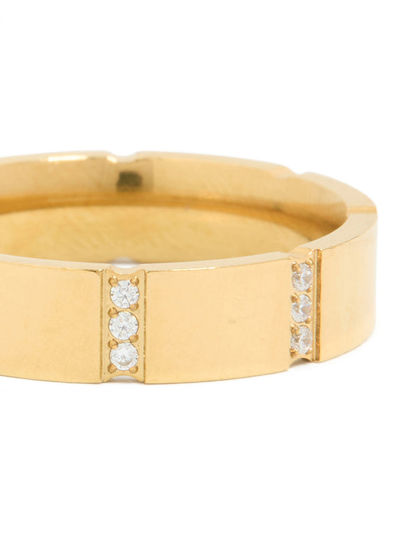 Showcasing waterproof stainless steel trio stripe ring in gold plated finish with cubic zirconia close up view