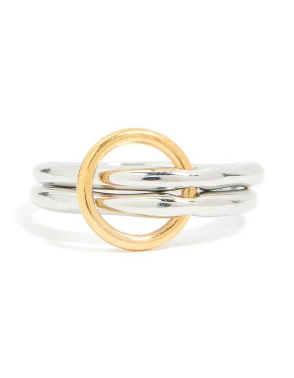 Presenting a waterproof mixed metal stainless steel stacked ring with interlocking circular silver and gold bands in chunky styling close up view