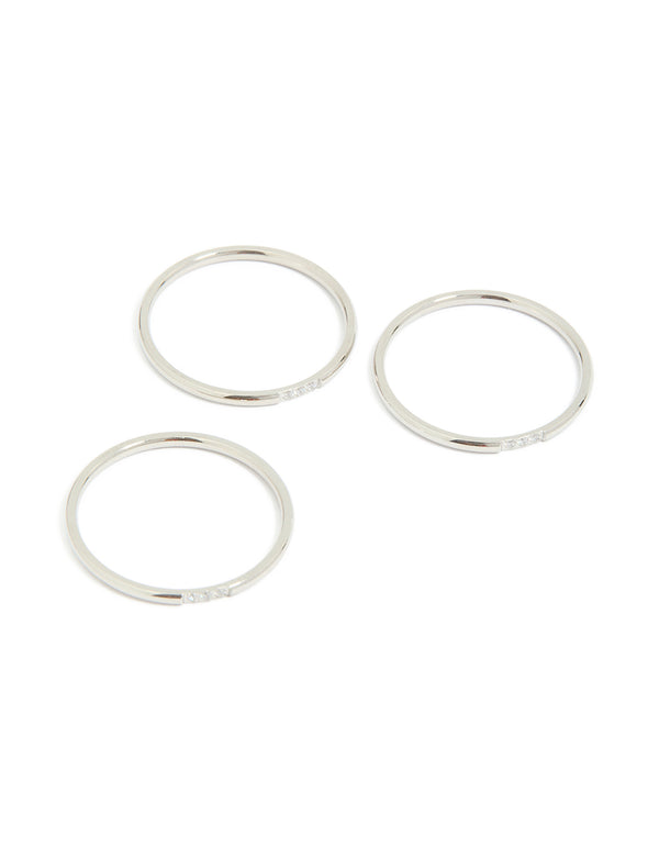 Featuring waterproof stainless steel thin cubic zirconia trio rings in a 3-pack with silver and clear stone front view