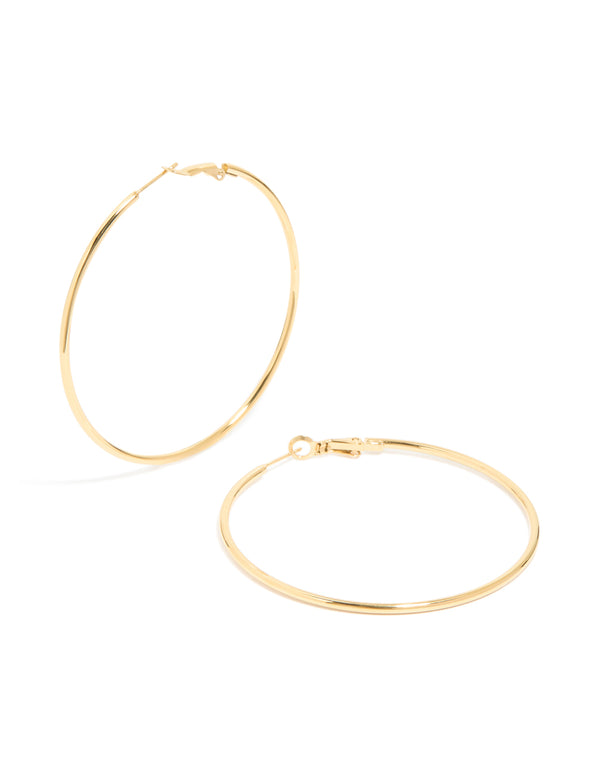Showcasing waterproof gold plated stainless steel hoop earrings in 55 MM size front view