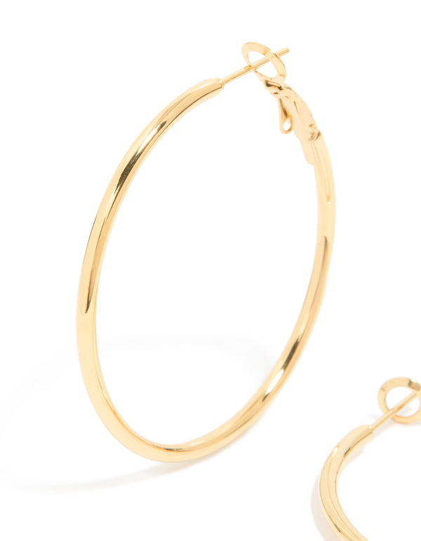 Detailed perspective of waterproof gold plated stainless steel statement hoop earrings close up view