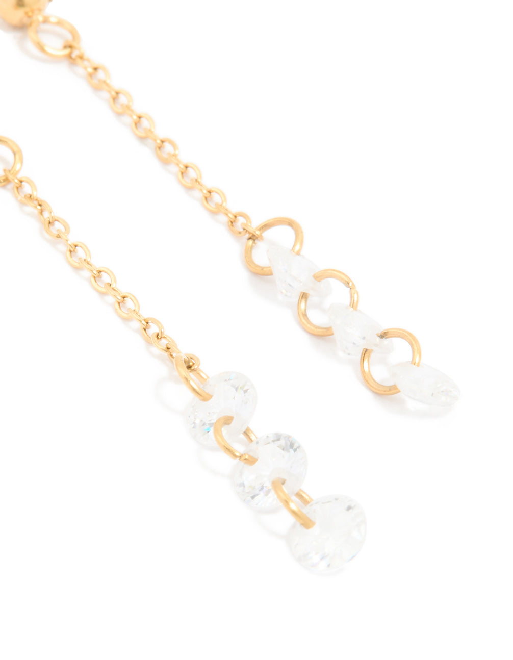 Detailed view of waterproof gold plated stainless steel cubic zirconia droplet chain earrings in gold and clear close up view
