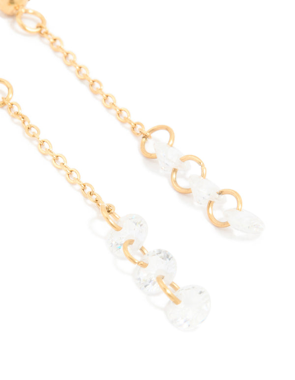 Detailed view of waterproof gold plated stainless steel cubic zirconia droplet chain earrings in gold and clear close up view