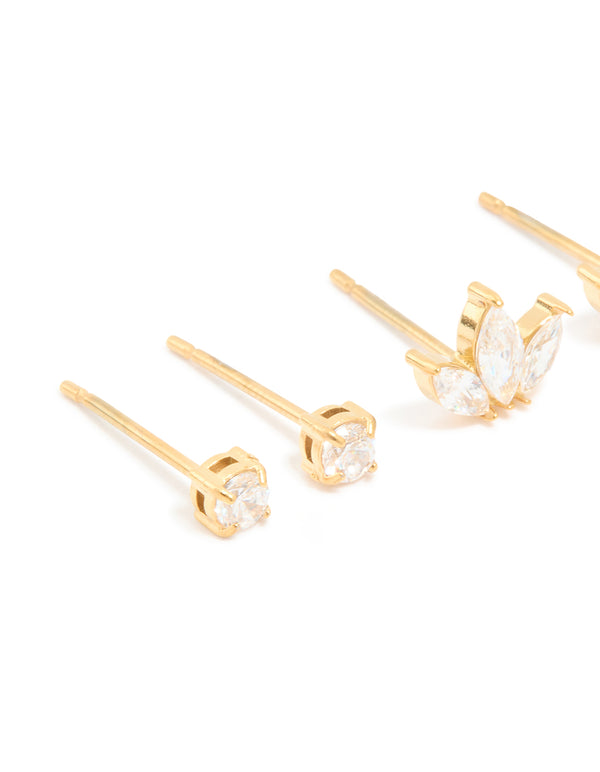 Featuring waterproof gold plated stainless steel cubic zirconia mixed shaped stud earrings in a 3-pack close up view