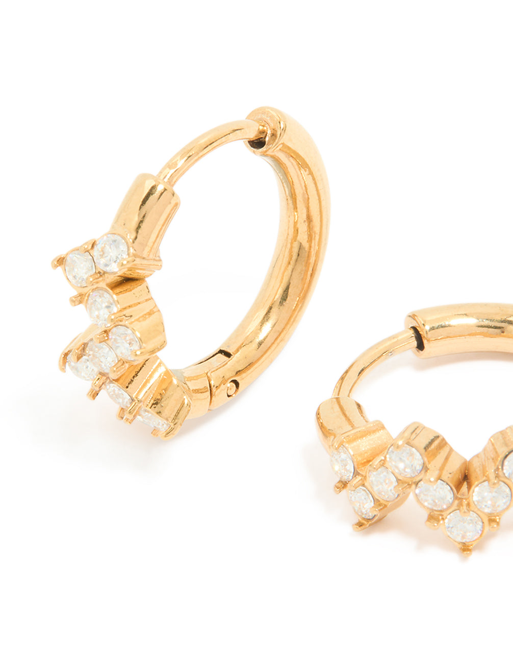 Designed with waterproof gold plated stainless steel cubic zirconia zig zag huggie earrings in clear close up view