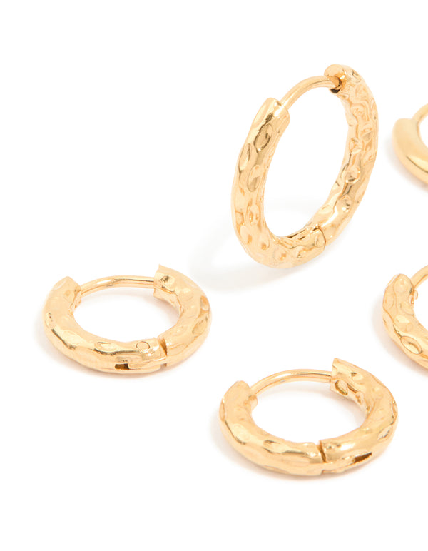 Showcasing waterproof gold plated stainless steel mixed detail huggie earrings in a 3-pack close up view