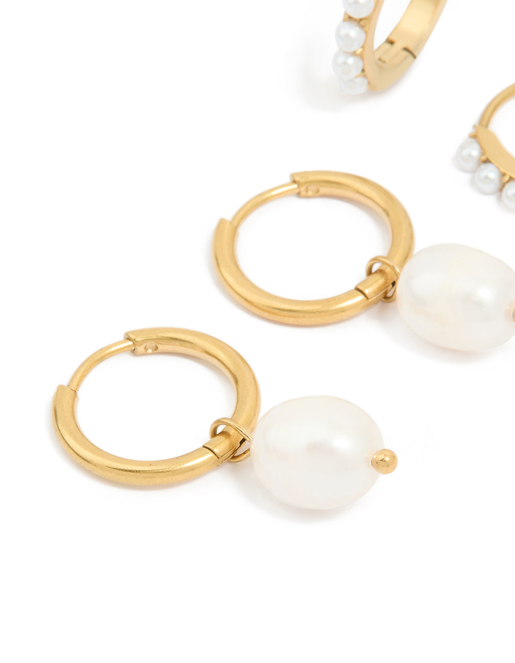 Highlighting the waterproof gold plated stainless steel pearl detail huggie earrings 2-pack and closure mechanism post detail view