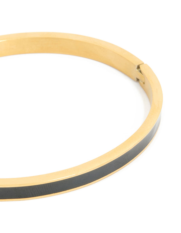 Crafted from waterproof gold plated stainless steel with thick black enamel hinged bangle in dainty style close up view