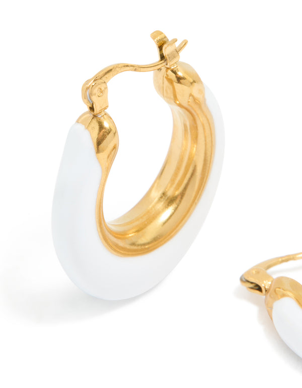 Highlighting the waterproof gold plated stainless steel construction and white enamel detail of long hoop earrings close up view