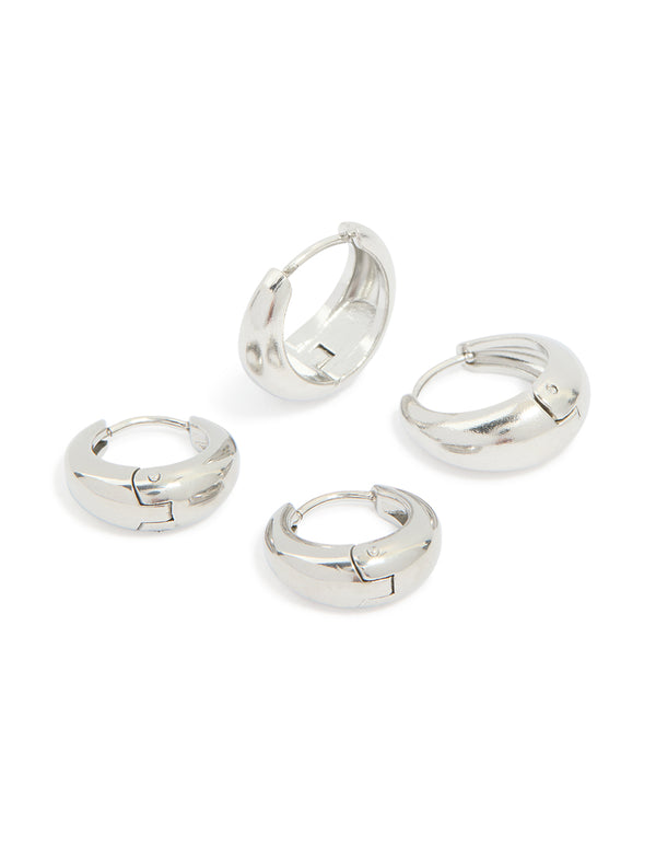 Showcasing chunky waterproof stainless steel oval huggie earrings in silver, 2-pack front view