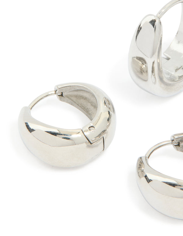 Featuring waterproof stainless steel chunky earrings in a 2 pack in silver with huggie closure close up view