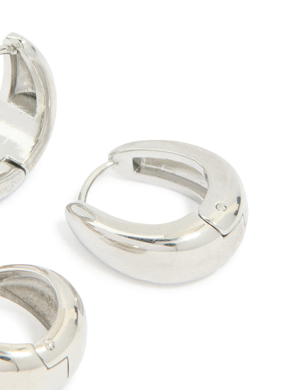 Highlighting waterproof stainless steel chunky earrings in a 2 pack in silver with huggie closure post detail view