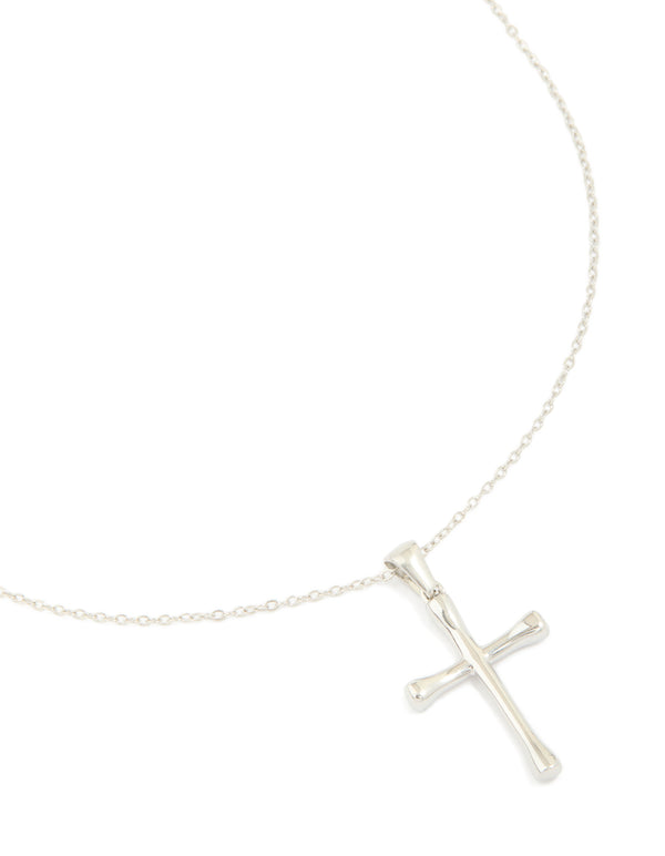 A waterproof stainless steel large cross pendant necklace featuring charm details in silver statement style front view