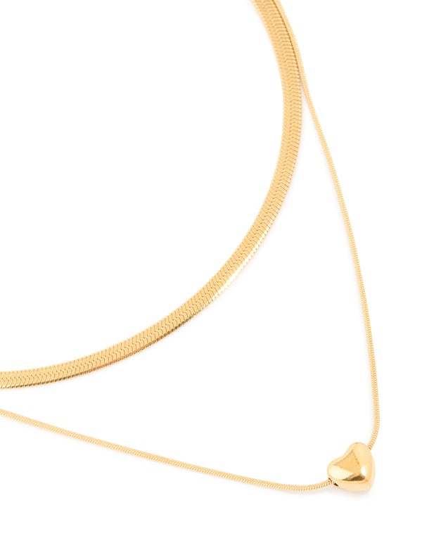 Waterproof gold plated stainless steel snake chain and heart pendant layered necklace close up view