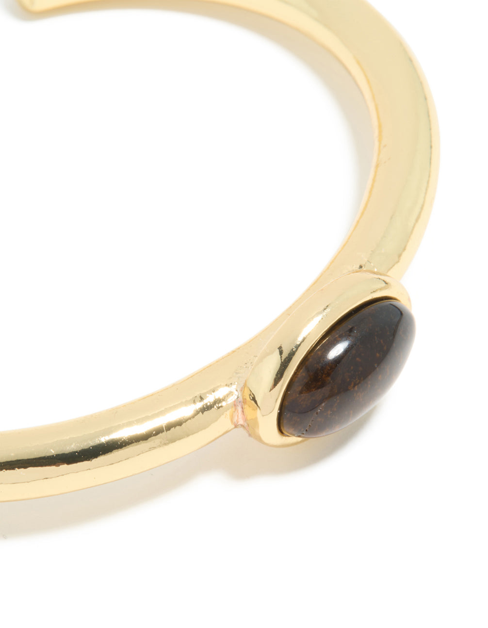 Designed with waterproof gold plated stainless steel, this open wrist cuff highlights the tigers eye semi precious stone setting close up view