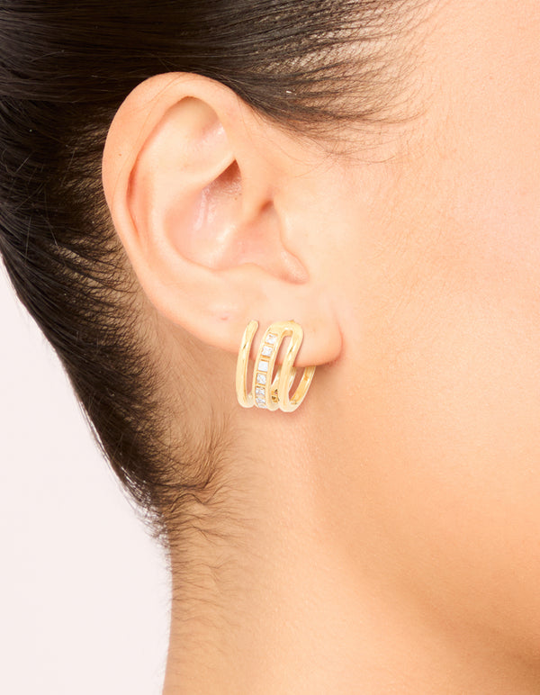 Showcasing waterproof gold plated stainless steel cubic zirconia illusion hoop earrings on ear view