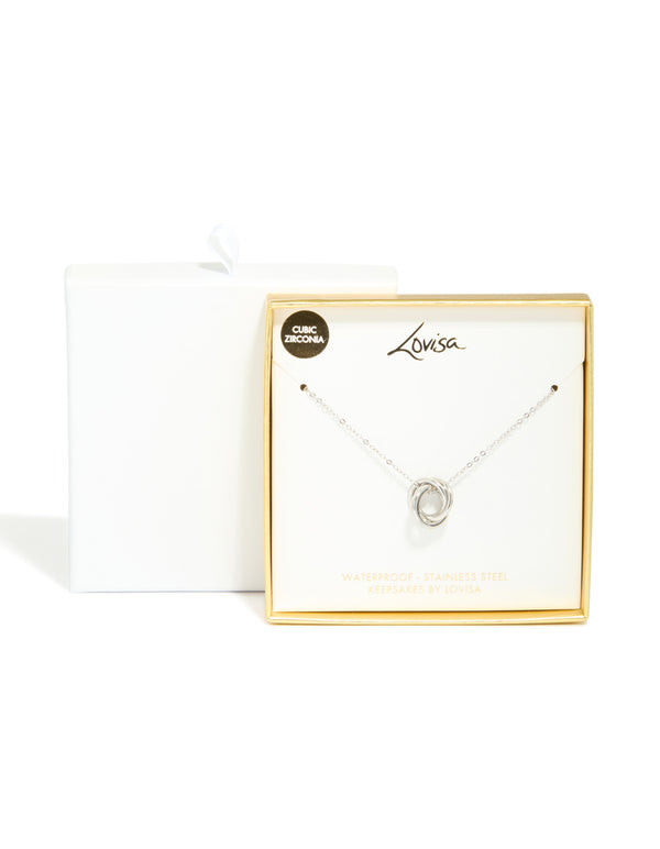 Designed with waterproof stainless steel and cubic zirconia, this triple circle link necklace in silver clasp detail view