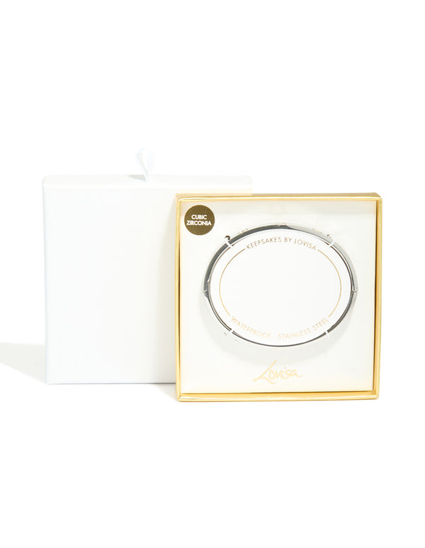 Showcasing a waterproof stainless steel cubic zirconia heart bangle in silver front view