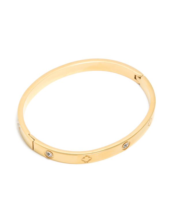 Designed with floral motifs, this waterproof gold plated stainless steel cubic zirconia bangle features polished finish and clear visibility front view