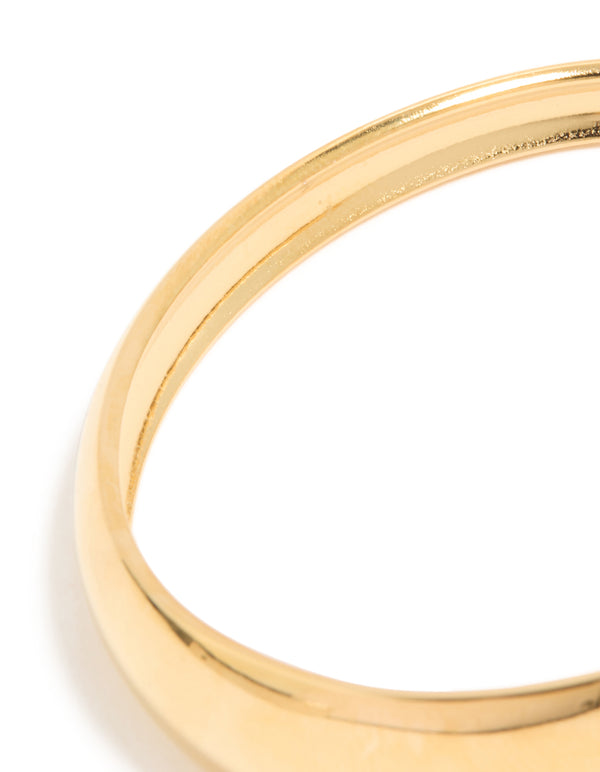 Designed with waterproof gold plated stainless steel, this asymmetrical wrist cuff in chunky style close up view