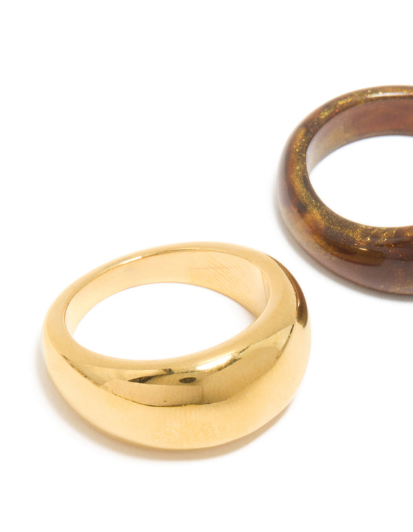 Crafted from waterproof gold plated stainless steel and brown modern stacking rings in a 2-pack with chunky style and glitter close up view