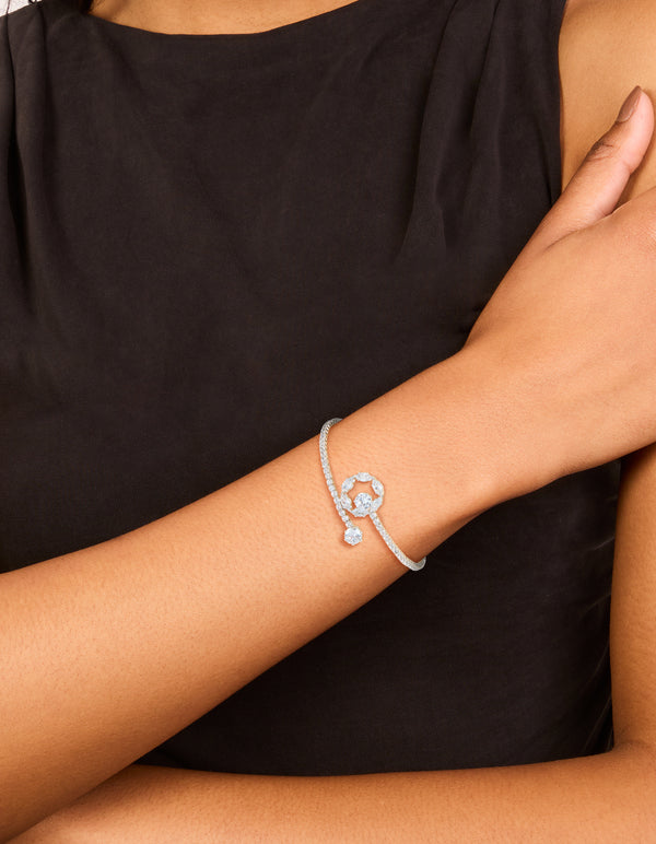 Featuring a silver cubic zirconia open circle wrist cuff bracelet on wrist view