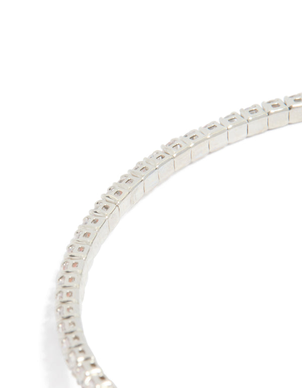 Highlighting a silver cubic zirconia open circle wrist cuff bracelet close up view