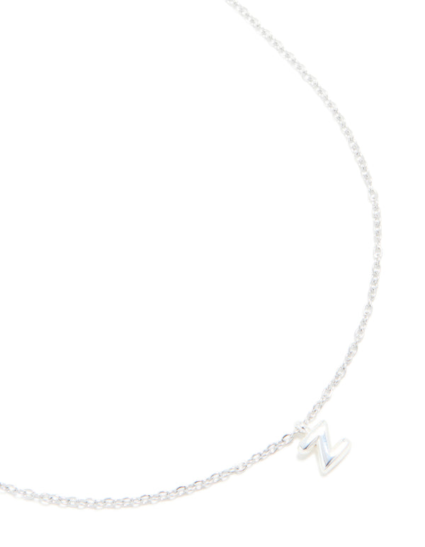 Featuring a waterproof stainless steel mini bubble letter Z necklace with initial pendant in silver and dainty styling close up view