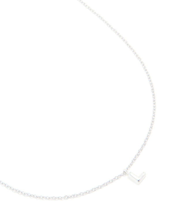 Showcasing a waterproof necklace with initial L pendant crafted from stainless steel in silver, designed with dainty style close up view