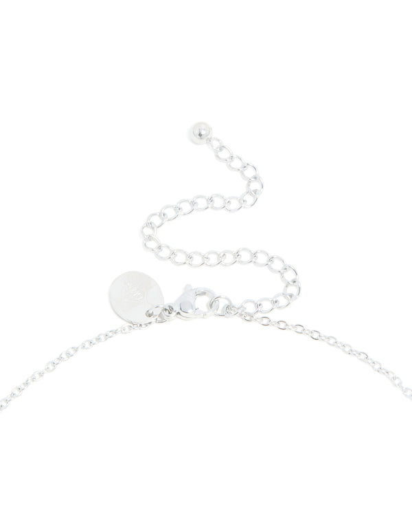 Highlighting waterproof stainless steel mini bubble letter R necklace with initial pendant in silver and dainty styling clasp detail view