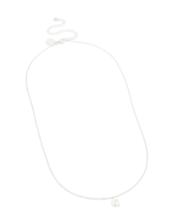 Featuring a waterproof stainless steel mini bubble letter Q necklace with initial pendant in silver front view